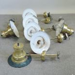 A set of seven mid 20th century enamelled and brass light fittings,