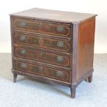 A 19th century mahogany and inlaid chest of drawers,