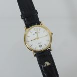 A Maurice Lacroix ladies wristwatch, on a black leather strap, boxed,