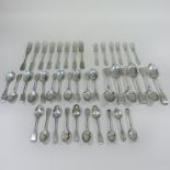 A mainly Victorian silver fiddle pattern part table service, comprising; six table spoons,