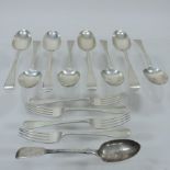 A set of eight Edwardian Old English pattern silver pattern table spoons, 21cm long,