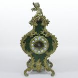 An early 20th century French Rococo style faux shagreen and gilt metal mounted mantel clock,