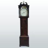 A late George III oak cased longcase clock, with an arched painted dial,