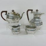 A modern silver four piece tea and coffee service, of octagonal baluster shape, comprising a teapot,