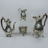 An Edwardian silver three piece coffee service, each of baluster shape,