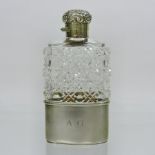 A late Victorian silver gilt mounted cut glass hip flask,