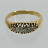 An 18 carat gold five stone diamond ring,