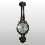 An ornate early 19th century rosewood, brass and mother of pearl inlaid wheel barometer,