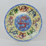 A modern oriental charger, decorated with a dragon,