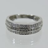An 18 carat white gold diamond dress ring,