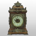 An early 20th century continental walnut and gilt metal mounted bracket clock,