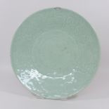 A 19th century Chinese celadon glazed porcelain charger,