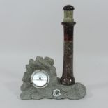 A hardstone souvenir barometer, in the form of a lighthouse,