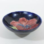 A Moorcroft pottery dish, with paper label,