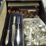 A collection of silver plated and other cutlery,