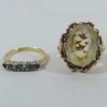 An 18 carat gold and diamond set five stone ring, boxed, together with an unmarked ring,