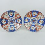 A pair of late 19th century Imari porcelain plates,