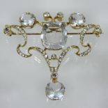 An early 20th century Russian 14 carat gold and beryl brooch,