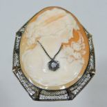 A 19th century unmarked yellow metal mounted diamond set cameo brooch,