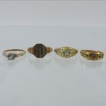 An 18 carat gold ring,