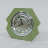 An Art Deco green bakelite cased mantle clock, 8.