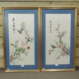 A pair of Japanese embroidered silk pictures of birds and flowers,
