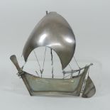 An unmarked Eastern silver model of a dhow,