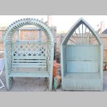 A green painted wooden garden arbour, with an arched top, 131cm,