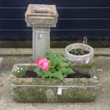 A reconstituted stone bird bath, 65cm tall,