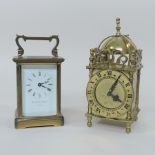 A brass cased carriage clock, the enamelled dial signed Matthew Norman, London, 15cm tall overall,
