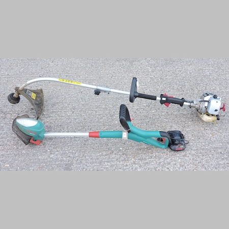 A Spear and Jackson petrol strimmer,