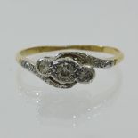 An 18 carat gold and diamond crossover ring