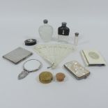A collection of items to include a mother of pearl purse, a silver cigarette case, hipflask,