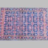 A Zaryan Persian rug, on a blue ground,