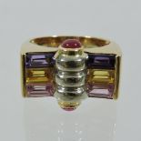 An 18 carat gold ruby, amethyst and pink sapphire ring,