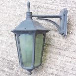 A black painted aluminium garden lantern,