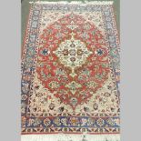 An Aheris Persian rug, on a cream ground,