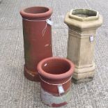 A collection of three chimney pots,