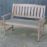 A slatted wooden garden bench,