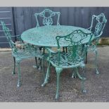 A green painted garden table, together with four chairs,