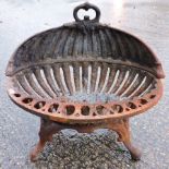 A cast iron fire grate,