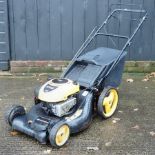 A McCulloch petrol driven lawn mower,