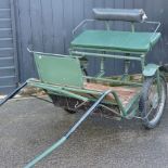 A green painted pony trap,