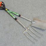 A stainless steel digging fork and spade