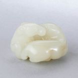 A CHINESE WHITE JADE 'TWO HORSES' PENDANT