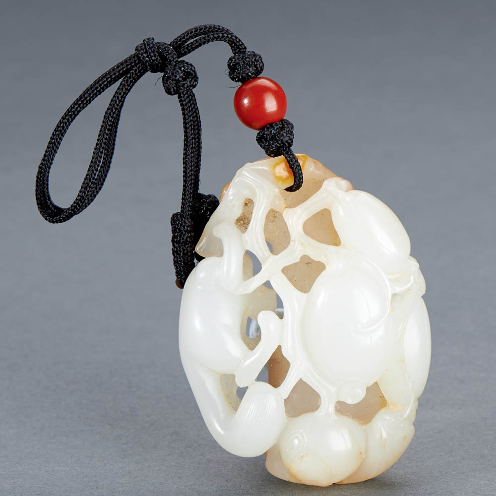 A CHINESE WHITE AND RUSSET JADE 'SQUIRREL AND PUMPKIN' PENDANT - Image 2 of 2