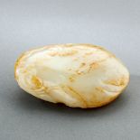 A CHINESE WHITE AND RUSSET JADE 'MELON AND BUTTERFLY' PAPER WEIGHT