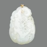 A CHINESE WHITE JADE DRAGON PENDANT