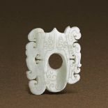 HAN DYNASTY (206 BC-AD 220) A WHITE JADE PENDANT, SHE L 4.9 cm. (2 in.) T 0.4 cm. 漢 白玉螭紋韘形珮