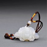 QING DYNASTY (1644-1911) A WHITE AND RUSSET JADE BUDDHA PENDANT L 4.5 cm. (1 3/4 in.) 清 白玉佛像吊墜